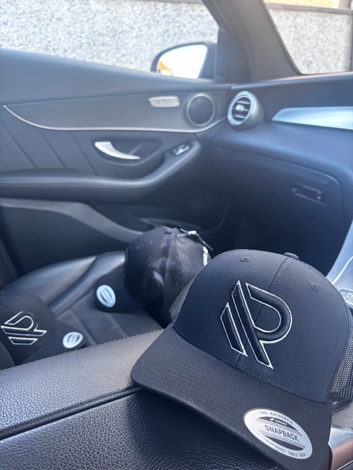 BLACK TRUCKER CAP